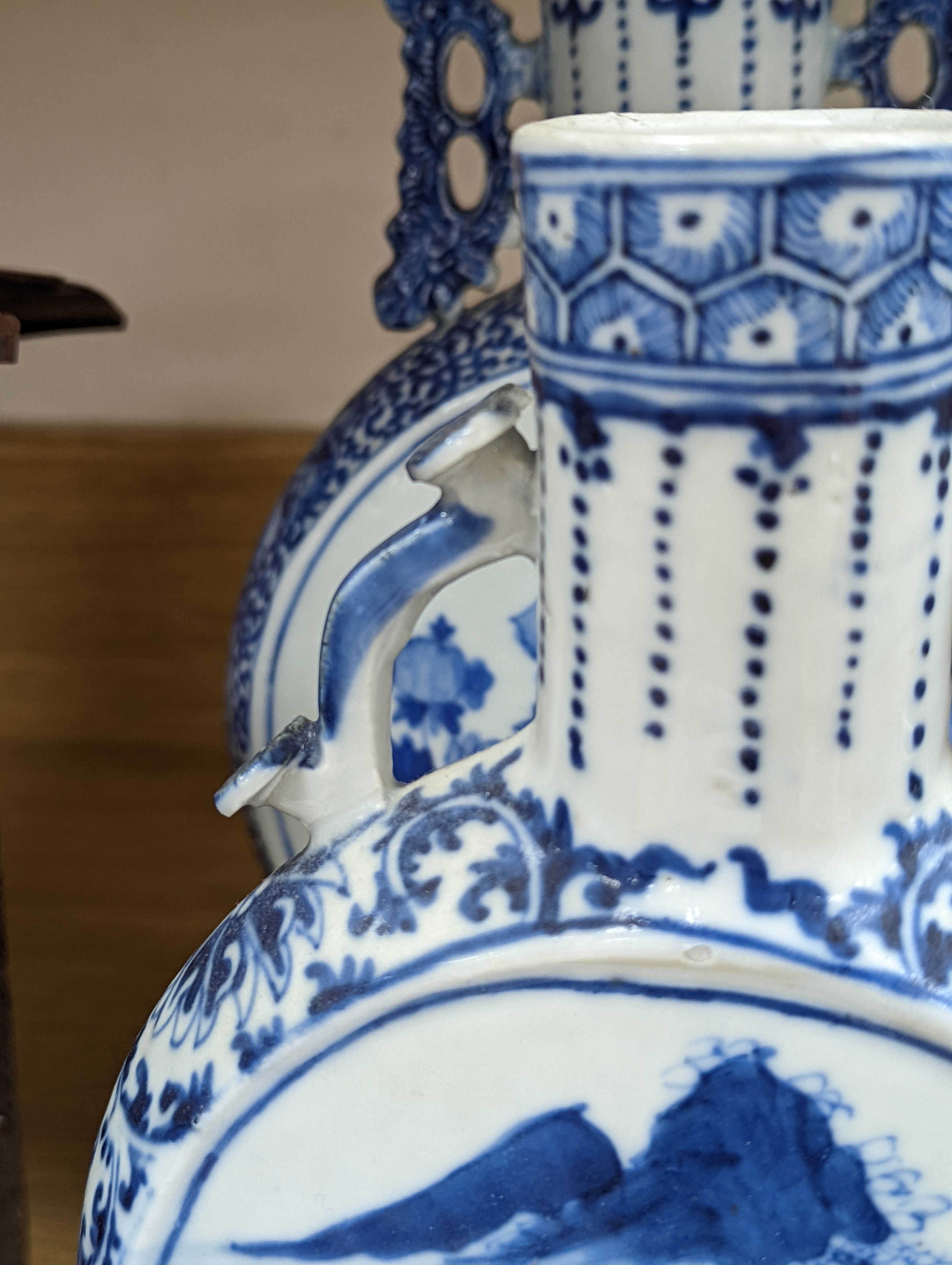 Three 19th century Chinese blue and white Moon flasks, tallest 31 cms.